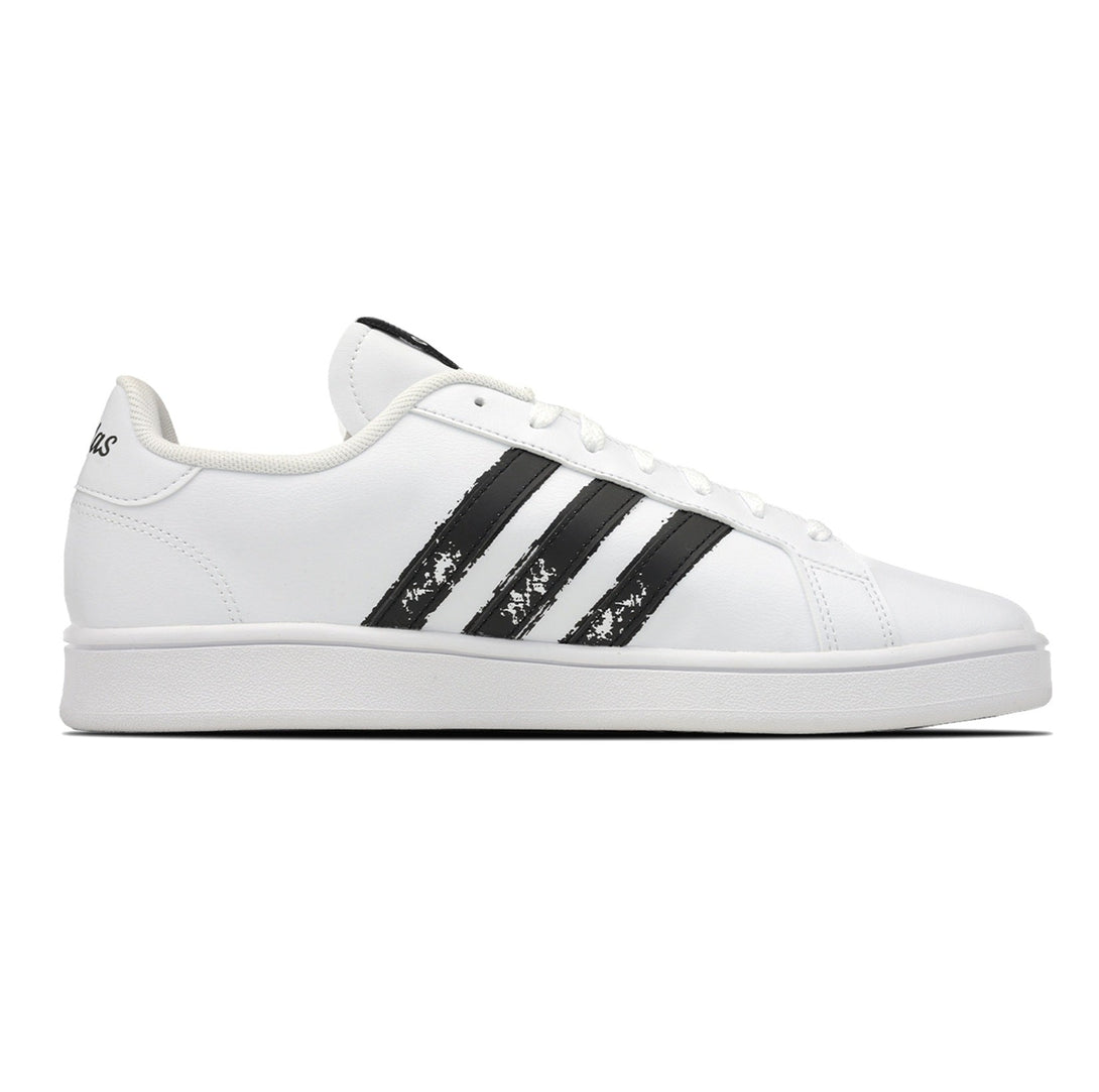 Adidas GRAND COURT BASE BEYOND Women sneakers featuring a classic white design with black stripes.