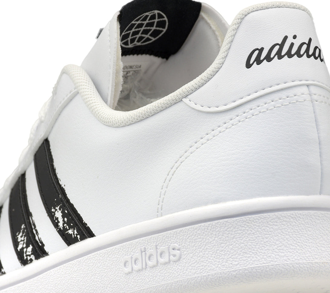 Adidas  GRAND COURT BASE BEYOND Women close-up image showcasing classic design and logo.