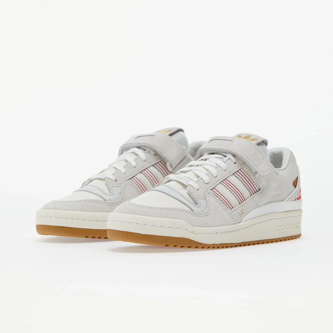 adidas x Arwa Al Banawi Forum 84 Low in grey with red accents, featuring a unique design for International Women's Day.
