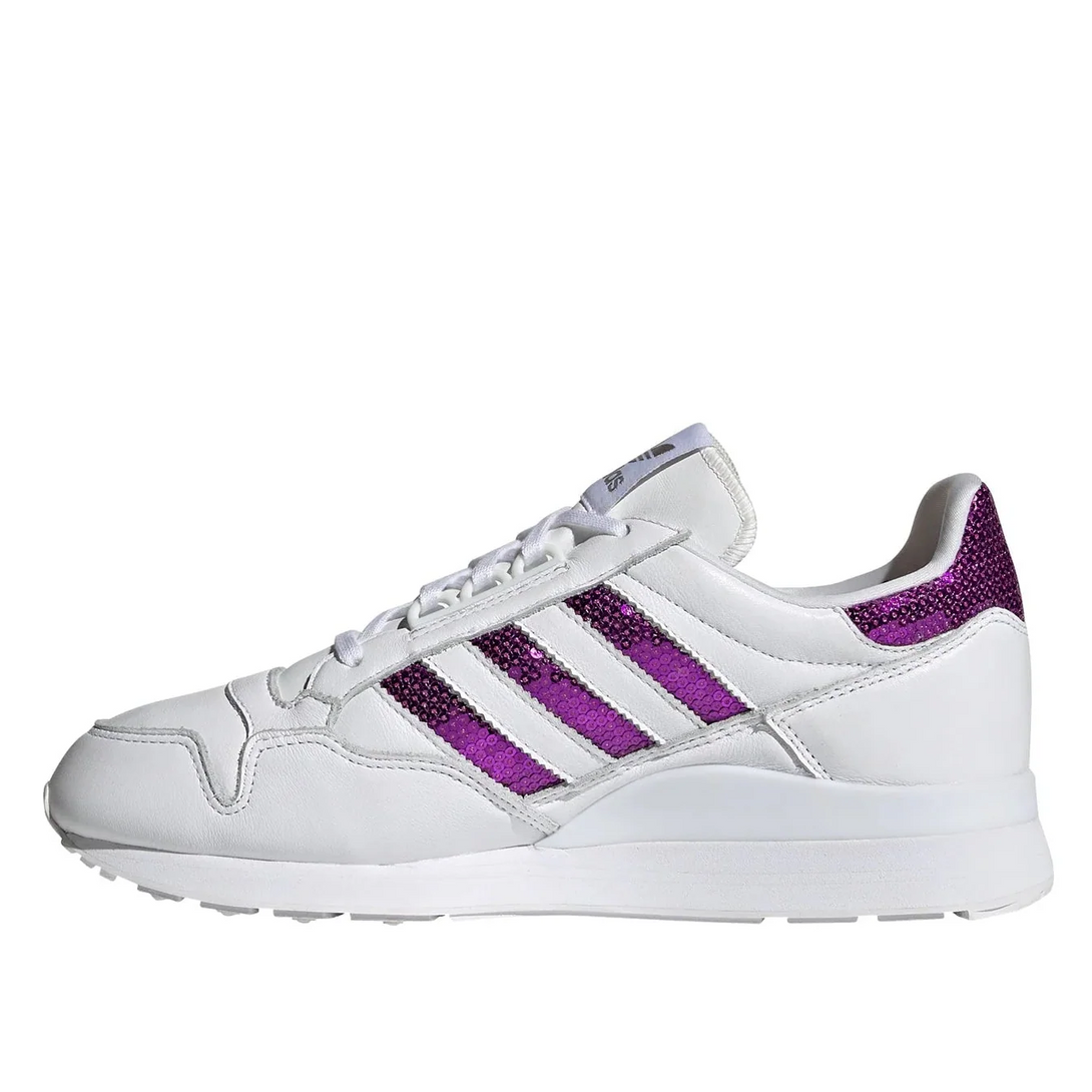 adidas ZX 500 Women purple sneaker in white and shiny purple details, stylish retro-modern design.