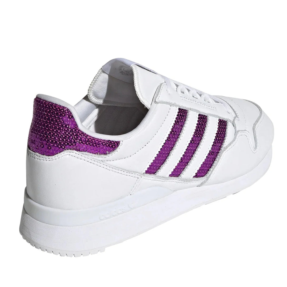 adidas ZX 500 Women purple sneaker with white and vibrant purple accents, showcasing retro design elements.