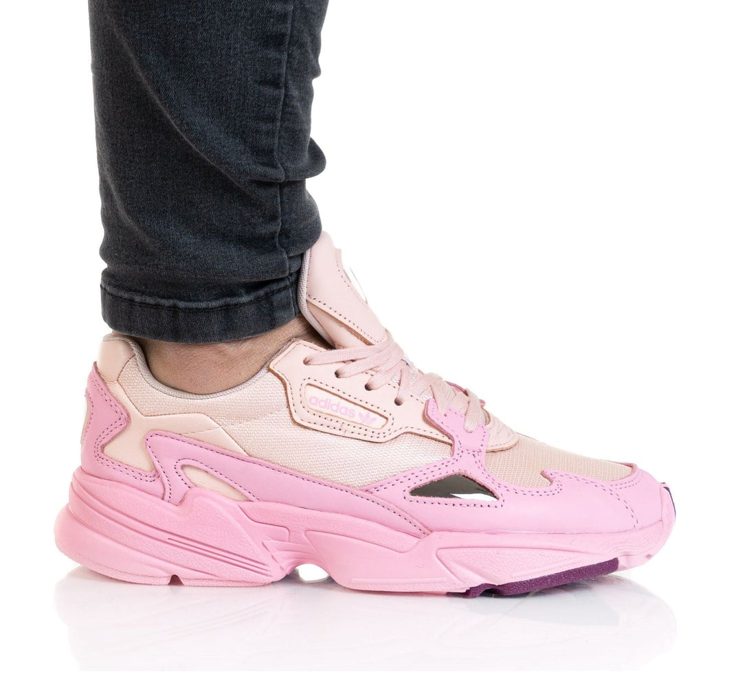 Image of adidas FALCON Women EF1994 in pink color, showcasing a sporty design and retro '90s style.