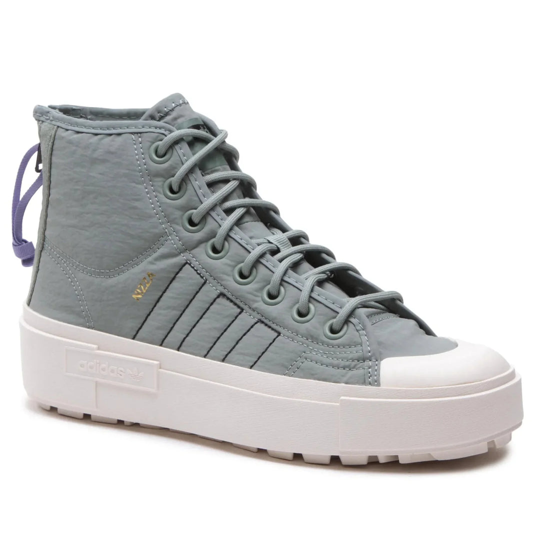 adidas Sneakers Nizza Bonega X Shoes HQ6042 Verde in a stylish light blue design with a white sole.