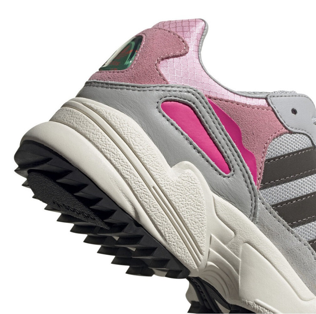 adidas YUNG-96 J Women sneaker close-up showing grey, pink, and black design elements.