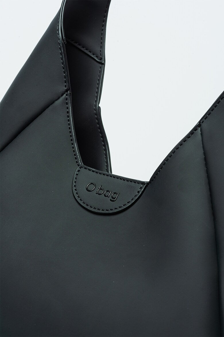Obag black women's bag featuring a sleek design and embossed logo for stylish versatility.